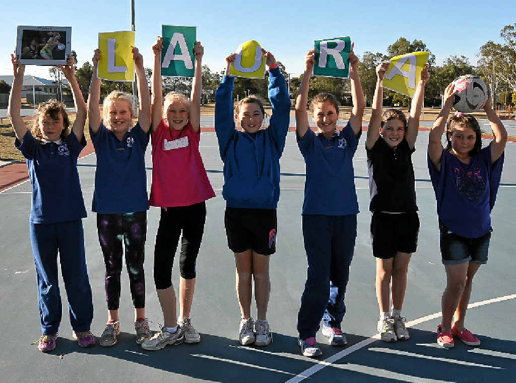 HOMETOWN HERO: Warwick netballers Sophie Edmunds, Larissa Vickers, Holly Naughten, Caitlin Auger, Brianna Gross, Lily Wacker and Daisy Wacker are cheering for Laura Geitz to win gold. HOMETOWN HERO: Warwick netballers Sophie Edmunds, Larissa Vickers, Holly Naughten, Caitlin Auger, Brianna Gross, Lily Wacker and Daisy Wacker are cheering for Laura Geitz to win gold.